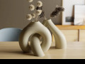 toroyidalna-vaza-shho-zednujetsia-small-0
