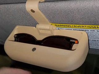 Автотримач для окулярів