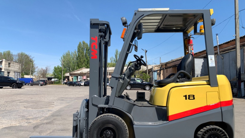 dizelnyi-avtopogruzcik-tcm-nissan-s-rotatorom-kabinoi-i-peckoi-big-0