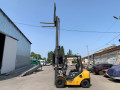 navantazuvac-komatsu-z-bicnim-zsuvom-ta-shhogloiu-45-metri-small-0